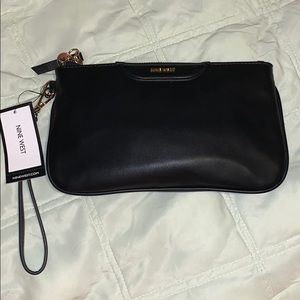 Nine West clutch, with card holder and zipper.